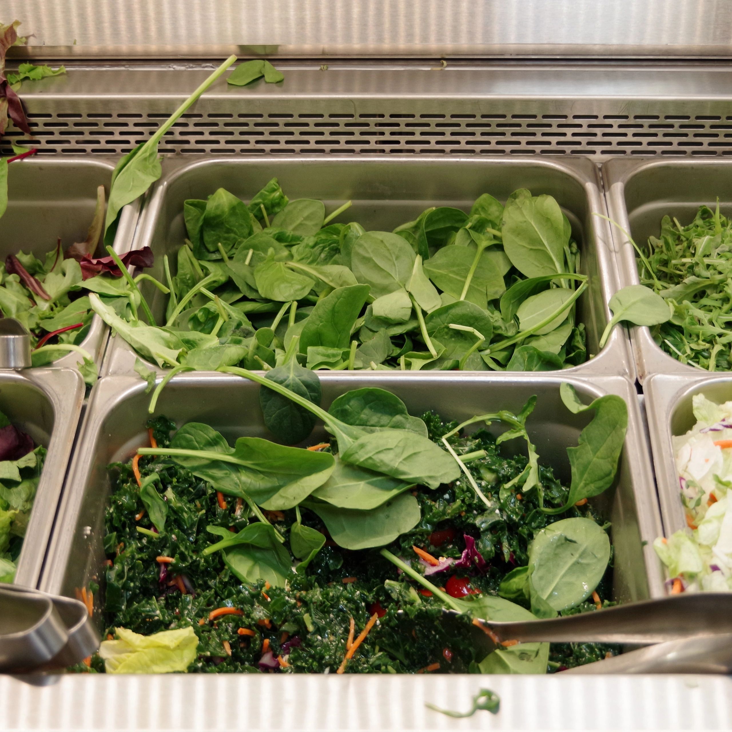 Prepared salad bar display in upscale grocery market
