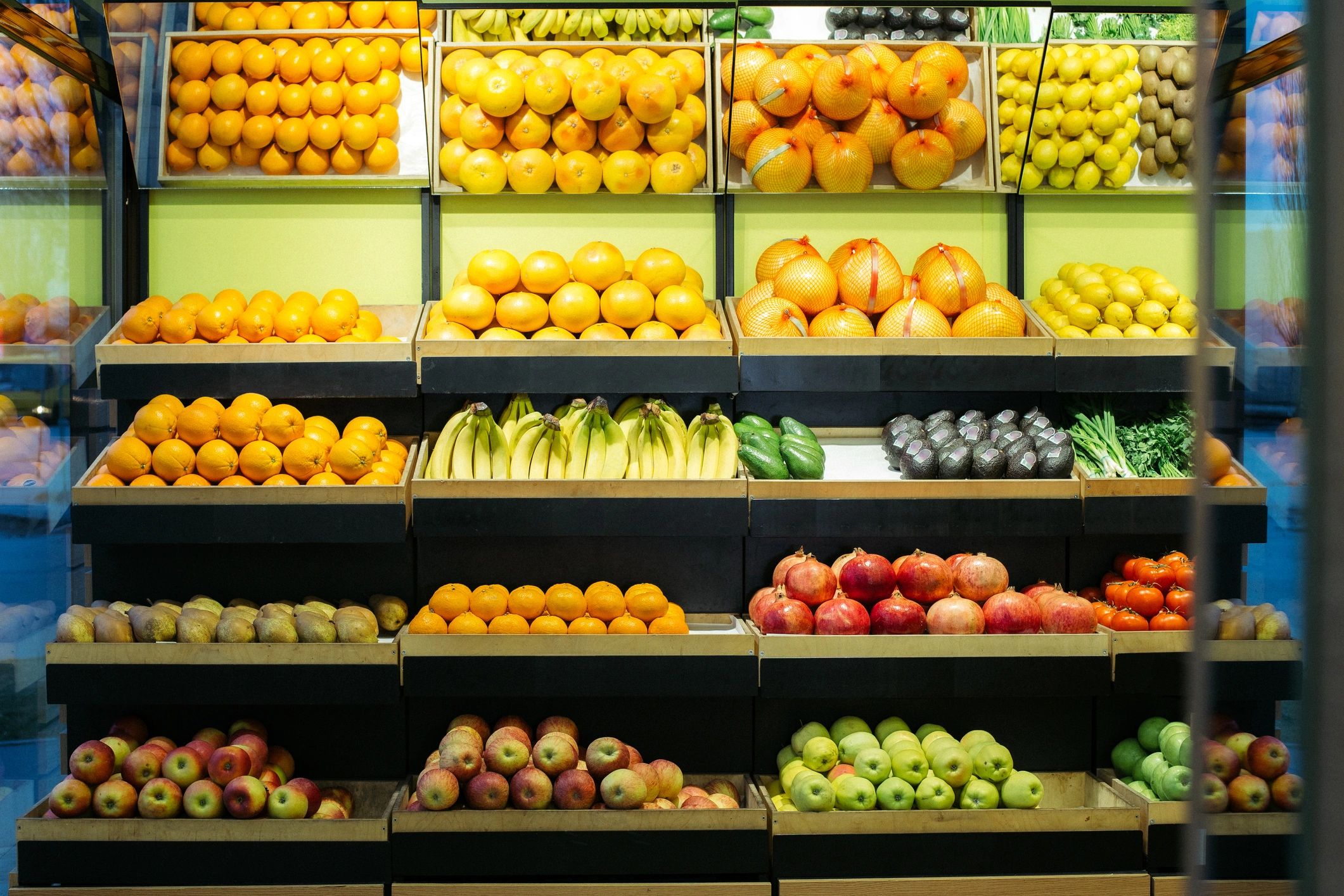 Fresh fruit display on grocery shelves
